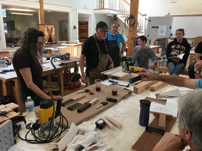 Instructors Kelly Parker and Mike Fortune during an ebonizing demo at the Florida School of Woodwork. - Addison LoPiccolo