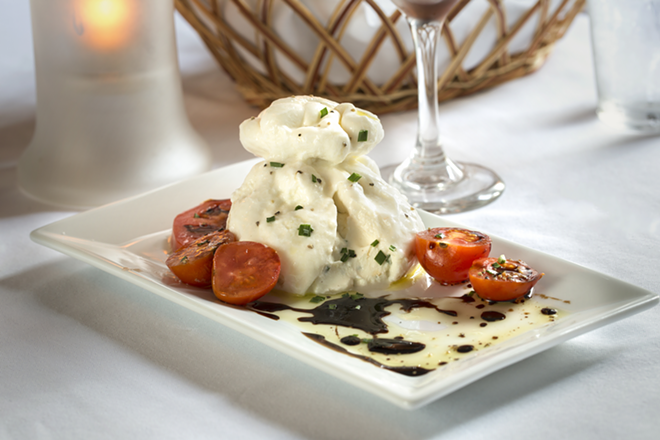 LITTLE THINGS: House-made Burrata mozzarella cheese with ricotta and local heirloom tomatoes. - Chip Weiner