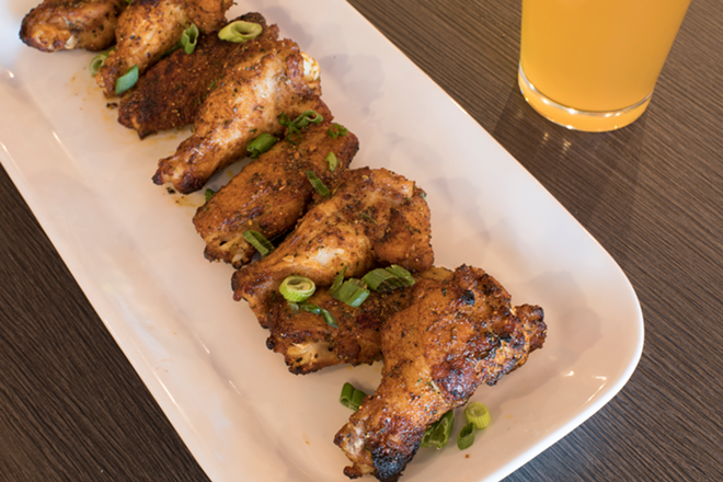 The restaurant's sensational baked wings with dry rub made by manager Emmitt Hicks. - Nicole Abbett