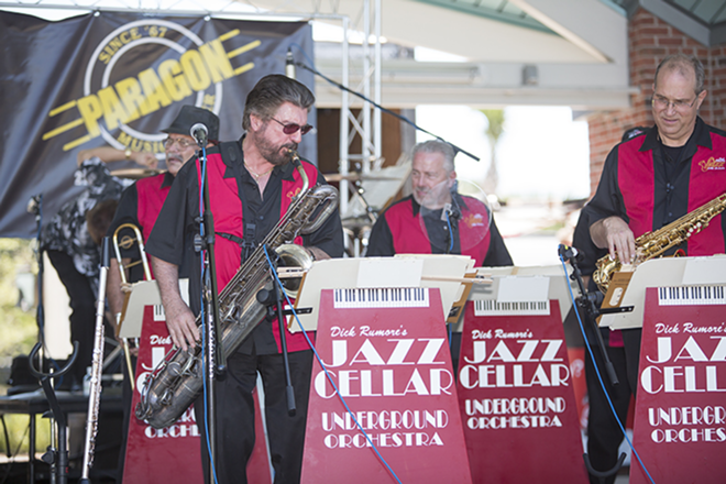 "We're getting the band back together". Dick Rumore, owner of Paragon Music, plays his saxophone on the stage with his band The Jazz Cellar Underground Orchestra for the first time in many years. They once played  in a club called the Jazz Cellar in Ybor Square - CHIP WEINER