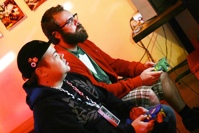 GAME ON: Barker (left) and Ijacic play one of their Nintendo 64s at the Bricks. - Daniel Figueroa IV