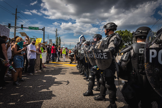 Protesters met by Tampa Police officers in College Hill on May 31. - PHOTO BY DAVE DECKER