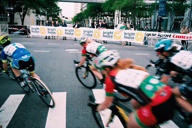Cyclists compete in the 2014 Gasparilla Criterium. The Sunshine Grand Prix is keeping the spirit of the race alive this weekend in downtown Tampa. - Michael Schumann