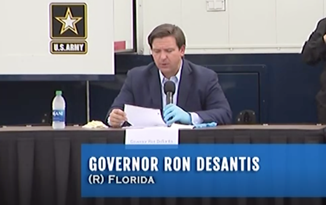 Florida Gov. Ron DeSantis wore a single rubber glove at a coronavirus briefing today for some reason
