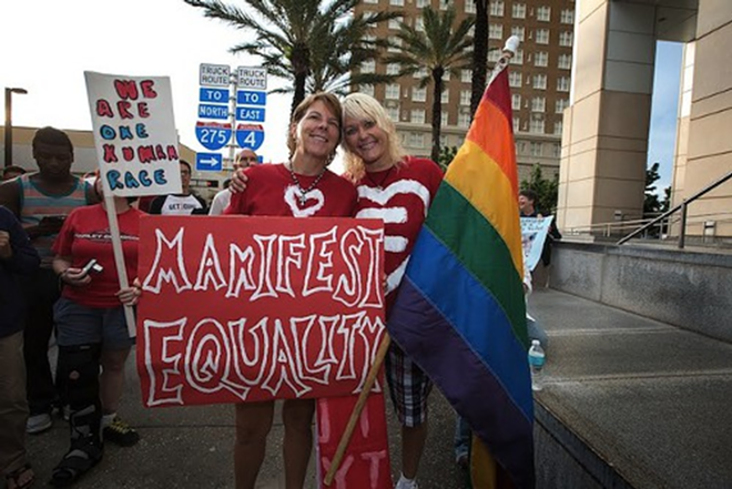 Barb Lawrence & Kimmy Denny celebrate the Supreme Court's decision on same-sex marriage Wednesday night in Tampa - Chip Weiner