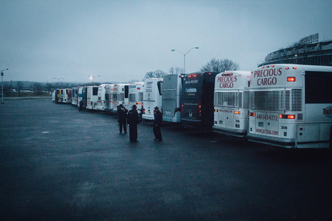 A line of buses that carried marchers from other regions. - Anthony Martino