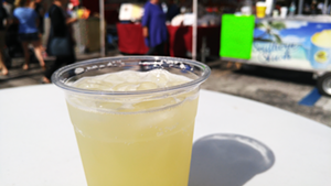 A cup of pineapple Tidal Boar at downtown St. Pete's Saturday Morning Market. - Meaghan Habuda