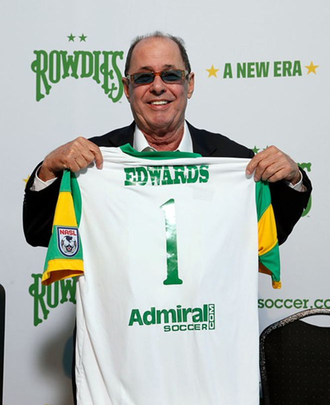 Shortly after announcing the changes to Al Lang Stadium, new owner Bill Edwards shows off a Rowdies jersey with his name on it. - Matt May/Tampa Bay Rowdies
