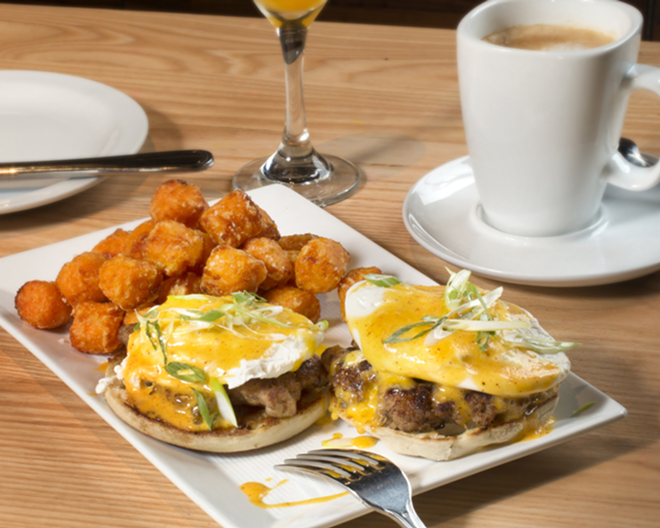 This version of eggs Benedict swaps Canadian bacon for house-made sausage. - Chip Weiner