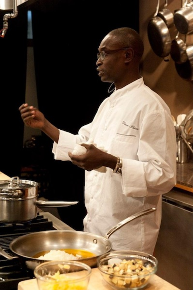 Chef Pierre Thiam spreading the gospel of eating with your hands. - Courtesy of Pierre Thiam