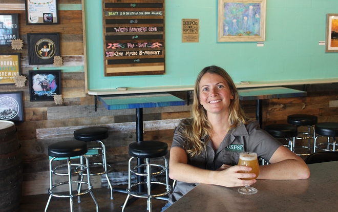 HEADS UP: Program Director Jennifer Sedillo (at Troubled Waters Brewing) hopes to open a lifeline to local breweries as well as help groom the next generation of brewers. - JENNA RIMENSNYDER