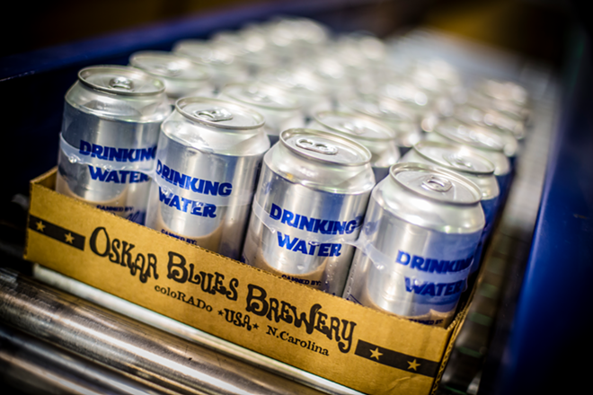 Colorado's Oskar Blues Brewery started filling the cans of clean drinking water on Friday. - Cigar City Brewing