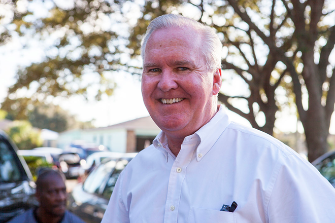 Tampa mayor Bob Buckhorn made the rounds at C. Blythe Andrews Jr. Public Library, where hundreds of voters stood in line for over an hours waiting to vote, before heading to the West Tampa Library. - Kimberly DeFalco