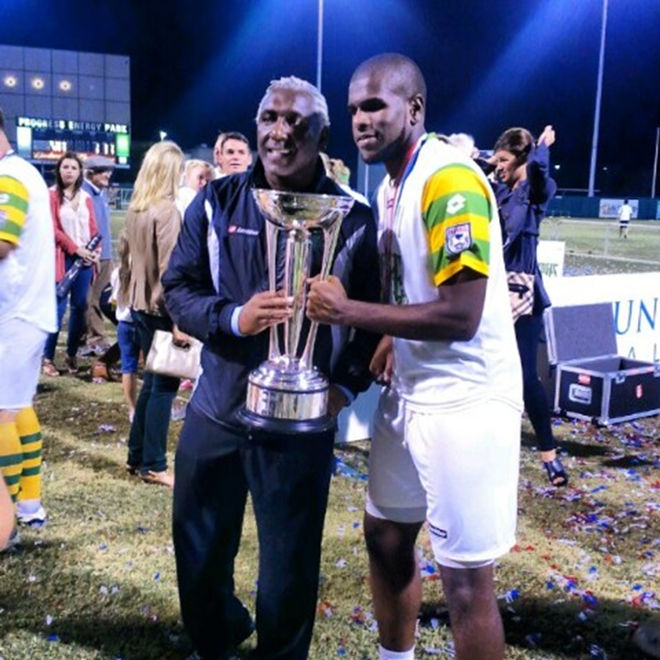 Rowdies coach Ricky Hill and Shane Hill celebrate with the NASL Soccer Bowl trophy after the Rowdies captured the championship over the Minnesota Stars - Christopher Girandola