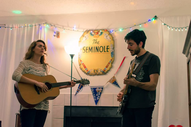 (L-R) Kathleen and Nick Arnal recording a live session in their old Florida apartment. - facebook.com