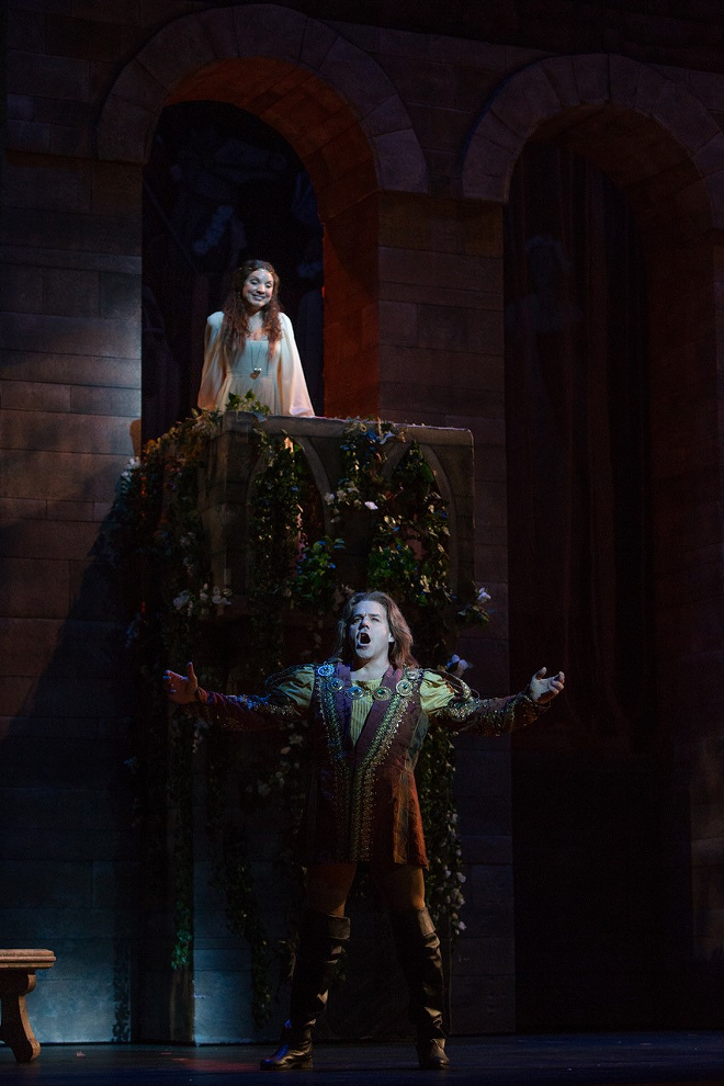 Richard Troxell (bottom) as Romeo and Sarah Joy Miller as Juliet in Opera Tampa's presentation of Gounod's adaptation of the Shakespeare classic at the David A. Straz Center for Performing Arts in Tampa, Florida. - Will Staples