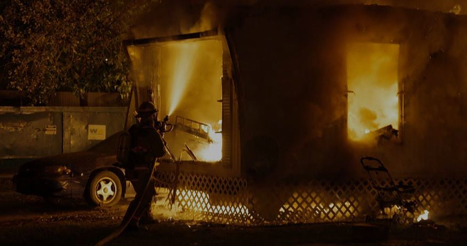 Tampa firefighters battle a mobile-home fire in the Season 4 premiere of A&E's nonfiction crime series "Nightwatch." - Courtesy of A&E Television Networks