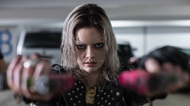 Samara Weaving is stupid good as Nix, a skilled killer forced to play a deadly game in "Guns Akimbo." - Saban Films