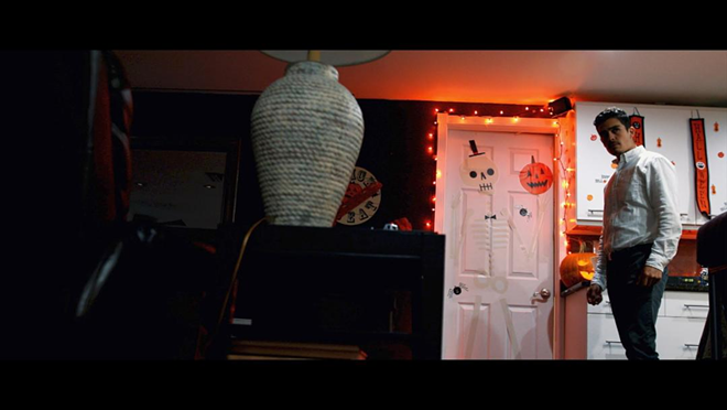 What's behind the door, you ask? Only Ben (Sean Michael Gloria) knows for sure, but he's dying for you to find out. - killDevil Films/Thomas Crane