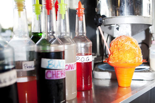 NEON RAINBOW: Shaved ice drizzled with vibrantly colored syrups is among Da Kine's attractions. - Chip Weiner