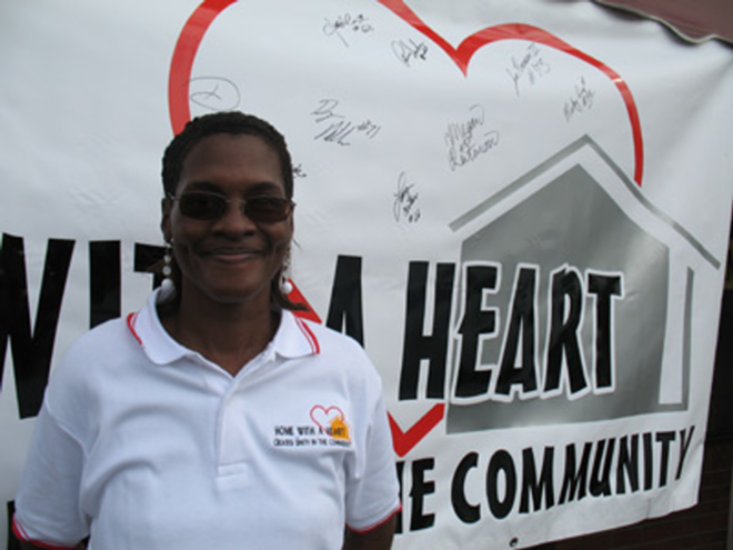 RETURNING THE FAVOR: Charlene Banks once received help from Home With A Heart; now she's a volunteer. - Alex Pickett
