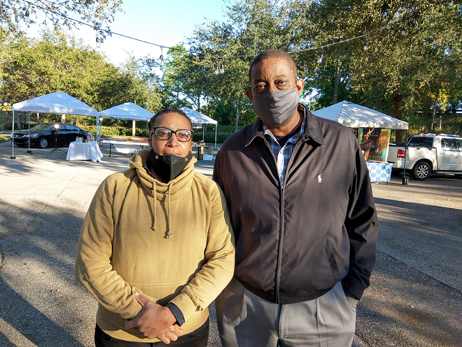South St. Petersburg Market Place founder Kim-Nikkol Patton (L) and Larry Butler of St. Pete Housing Authority.