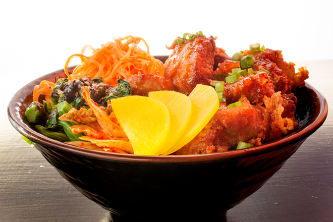 Chop Chop Shop's karaage bowl of Japanese fried chicken, orange sauce, purple slaw, pickled carrots, kimchi and mean greens. - Chip Weiner