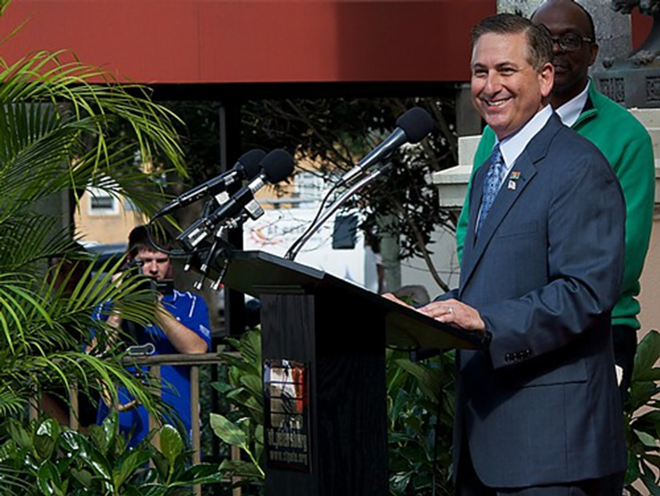 SUNNY DAY: Mayor Kriseman gives his inaugural speech on Jan. 2 as Master of Ceremonies Bob Devin Jones looks on. - Kevin Tighe