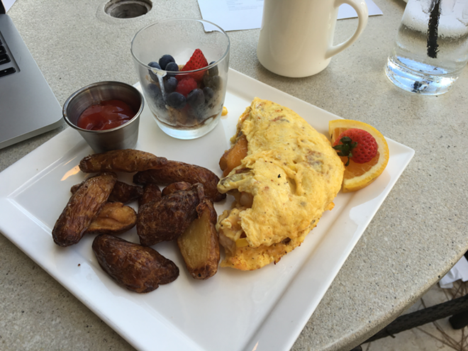 The Low Country Omelet, with andouille, shrimp, corn, potatoes and cheese was the healthier option. Pinky swear. - Cathy Salustri