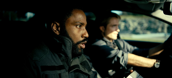 The Protagonist (John David Washington, left) and Neil (Robert Pattinson) fight to save the planet in real time, and inverted time, in "Tenet" - Melinda Sue Gordon