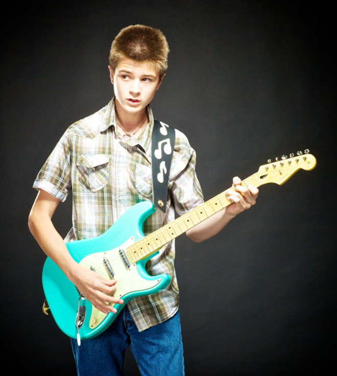 Zack Biss with the guitar he and his father made together. - Todd Bates