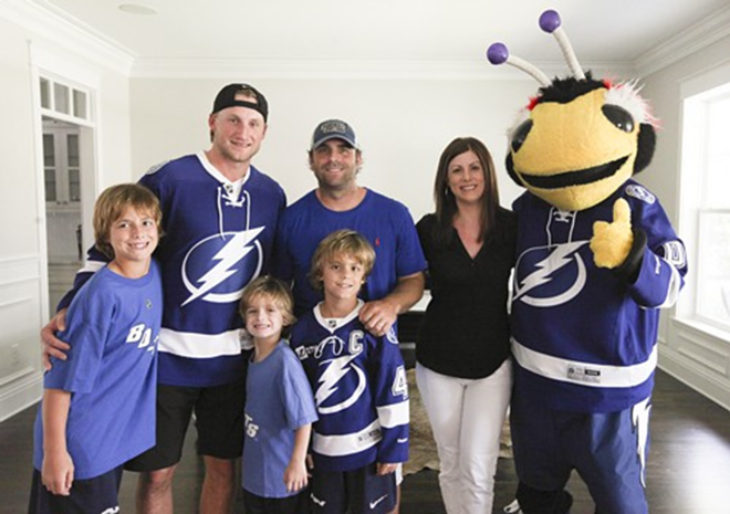 Chris and Shelly Girsch and their three boys, Tyler, Colin, and Nicholas, get the surprise of their lifetime from Steven Stamkos and Thunderbug - Nicole Abbett