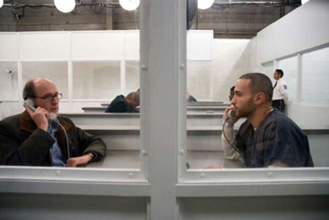 MAKING A CONNECTION: Richard Jenkins, (left) visits Haaz Sleiman in a detention center for illegal immigrants in The Visitor. - Overture Films