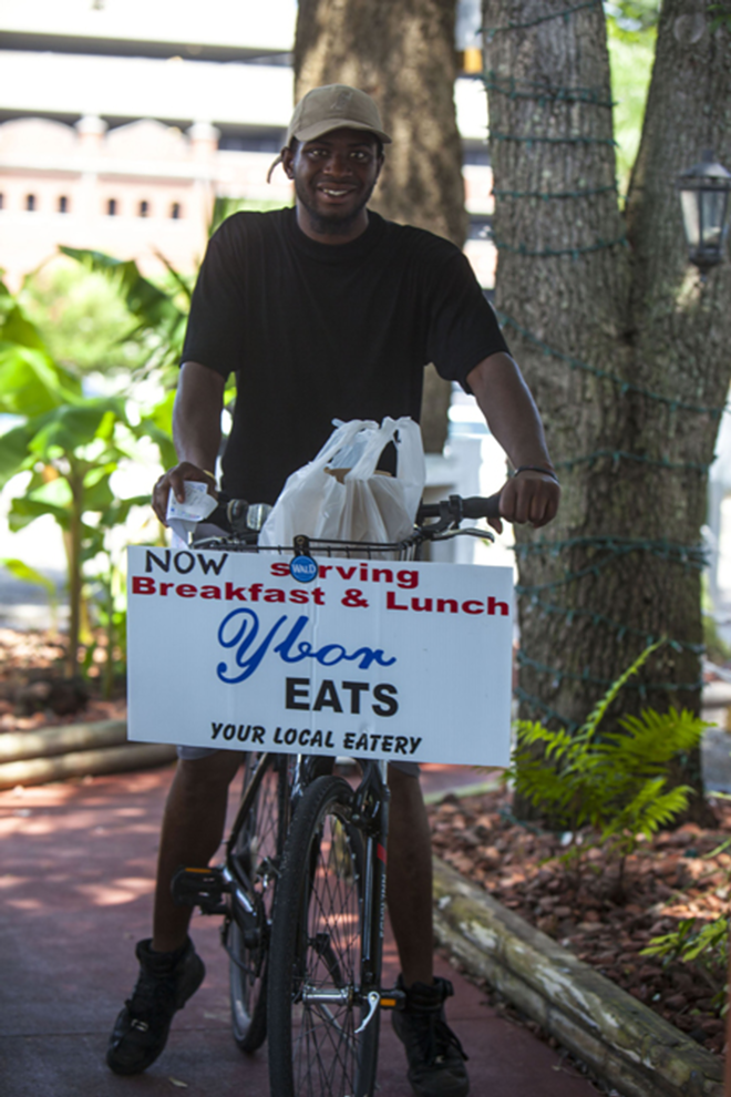 Ybor Eats associate Devon Clark makes free deliveries, mostly cheesesteaks. throughout Ybor City. - KIMBERLY DEFALCO