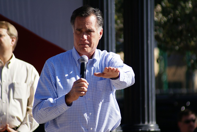 Mitt Romney speaks to about 600 supporters in Downtown Dunedin, saying that he enjoyed Cypress Gardens as a child. - Jeanne Holton Carufel