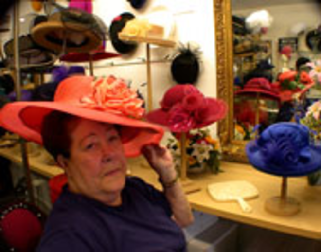 TOP HATS: Betty Masar, owner of Woodies Hat Box, - sells premium Jack McConnell hats that cost up to - $700. - CARRIE WAITE
