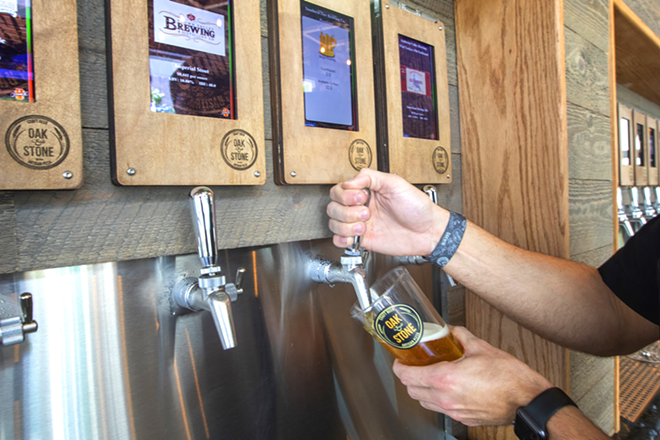 Oak & Stone showcases a gleaming array of 48 DIY craft beer taps in downtown St. Pete. - Chip Weiner