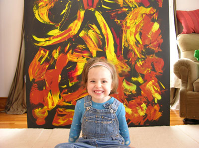 CHILD'S PLAY: A beaming Marla Olmstead stands proudly in front of one of her paintings in My Kid Could Paint That. - Sony Picture Classics