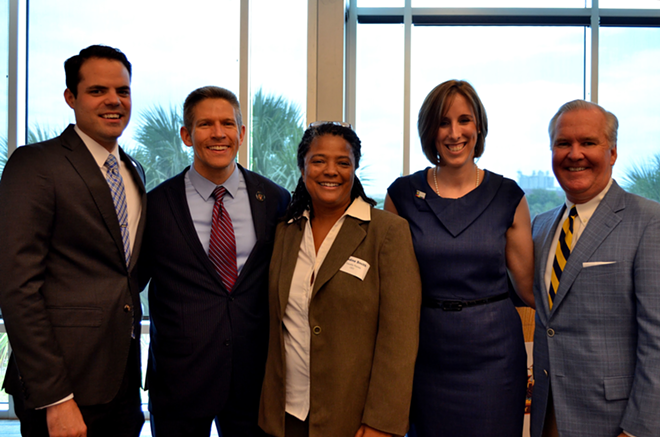 Equality Florida's Nadine Smith, center, and HRC's Cathryn Oakley with (left to right) State Representative Joe Saunders, Hillsborough County Commissioner Kevin Beckner, and Tampa Mayor Bob Buckhorn. - Zebrina Edgerton-Maloy
