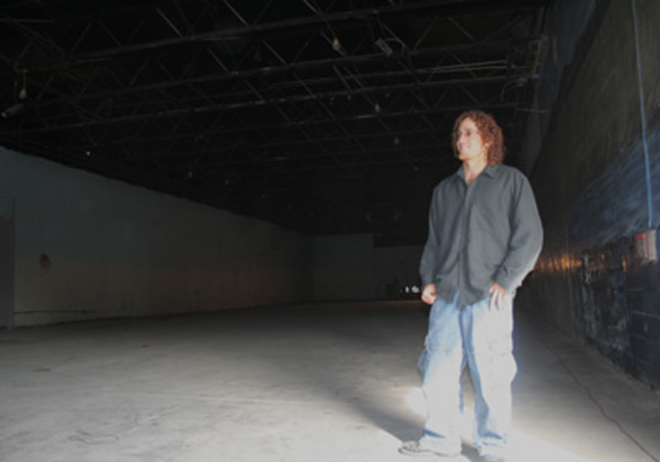 Blake Emory, 25, inside his new arts space off Seventh Avenue in Ybor City. - Alex Pickett