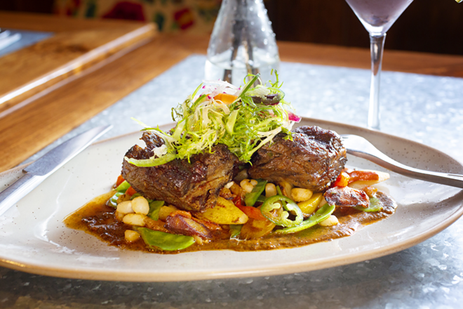 Topped with glistening frisée, grilled, tender braised honey chipotle short ribs have lots going on. - Chip Weiner