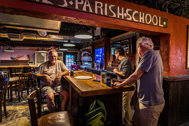 New World Brewery owner Steve Bird (L) and Spiritual Janitor Dean Rosenberger (center) at the venue, restaurant and bar's new location in the Sulphur Springs neighborhood of Tampa, Florida on Jan. 29, 2020. - PHOTO BY DAVE DECKER