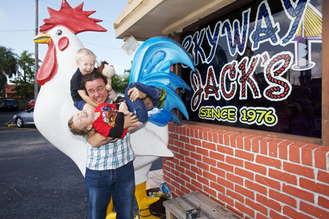 WAKIN’ FOR BACON: Andy Seely with his sons Marek, 6, and Ivo, 3, outside Skyway Jack’s for their 155th Tampa Bay Breakfasts review. - Todd Bates