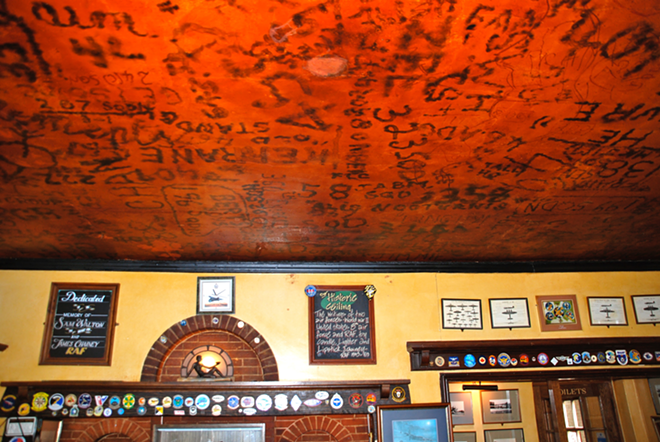 Ceiling of the Eagle Pub, Cambridge, UK, where American GIs in WW2 used cigarette lighters to write their names and unit numbers - Photo by Ben Wiley