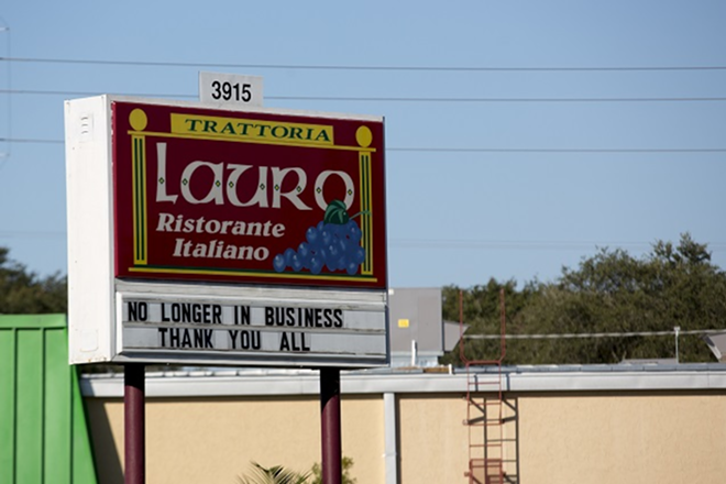South Tampa's Lauro Ristorante sports a farewell message to longtime patrons. - Chip Weiner
