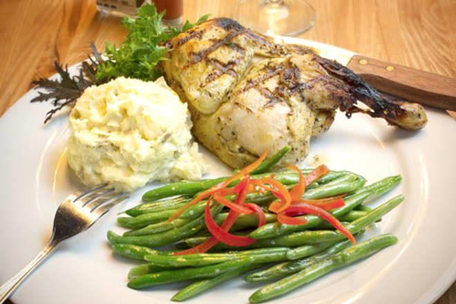 The restaurant's Bird is the Word spotlights citrus-rosemary half chicken. - Chip Weiner