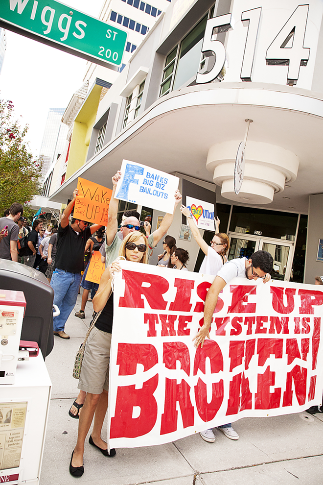 THE FIRE LAST TIME: An Occupy march in Downtown Tampa last October. - Shanna Gillette