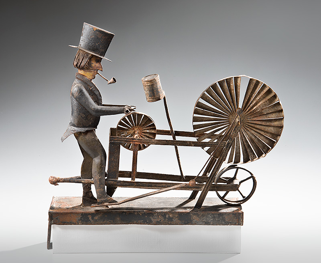 "Knife Grinder," by unidentified artist, c. 1875. Paint on tin. Collection American Folk Art Museum, Gift of Ralph Esmerian. - Photo by Gavin Ashworth
