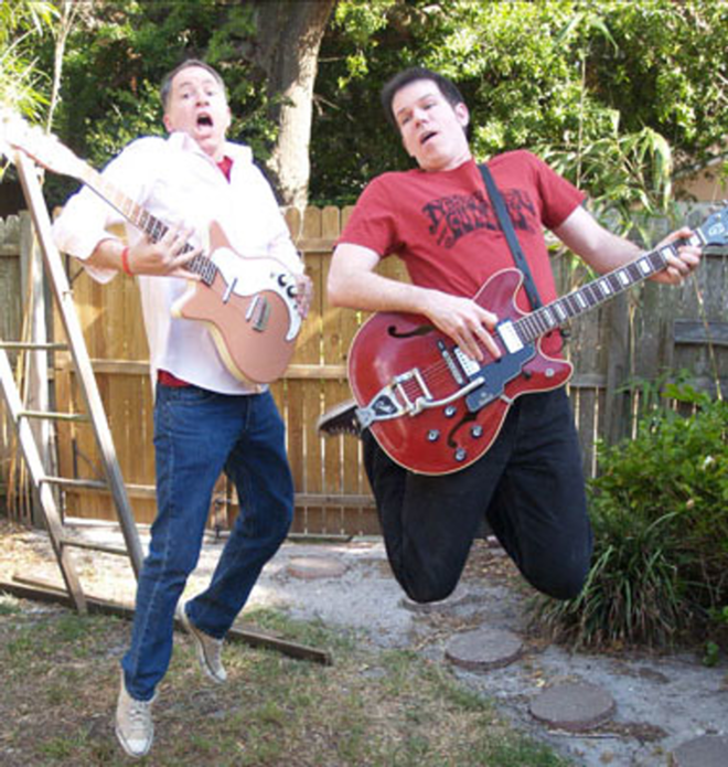 WHITE ROCKERS CAN'T JUMP: Ed Woltil (left) and Brian Merrill work out some rock moves in Merrill's backyard. - Valerie Troyano