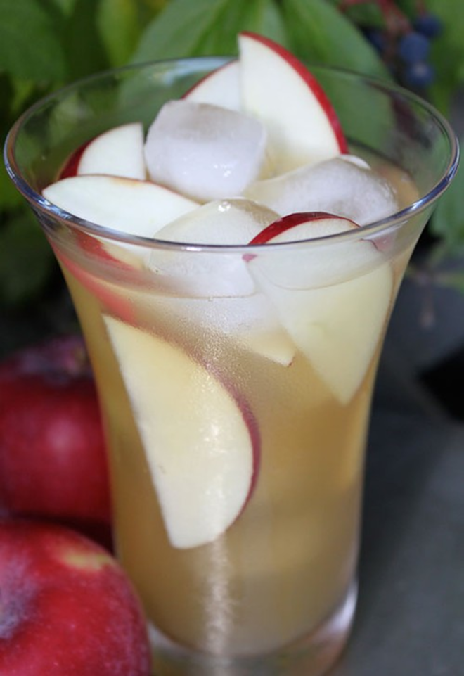 Grab some rum, apple cider, maple syrup, lemon juice and apple slices for a glass of Harvest Punch. - WEDDINGBELLS.CA